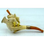 AN ANTIQUE MEERSCHAUM AND AMBER SMOKING MONK PIPE. 10 cm wide.
