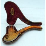 A LARGE ANTIQUE SILVER MOUNTED CARVED MEERSCHAUM AND AMBER PIPE of scrolling form. 19 cm x 11 cm.