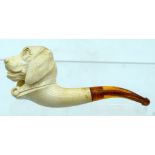 AN ANTIQUE MEERSCHAUM AND AMBER DOG PIPE. 8.5 cm wide.