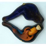AN ANTIQUE MEERSCHAUM AND AMBER BIRD CLAW PIPE. 12 cm wide.