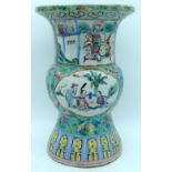 A LARGE 19TH CENTURY CHINESE FAMILLE ROSE PORCELAIN GU FORM VASE Qing, painted with figures and flow