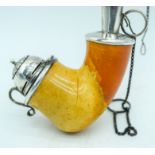 AN ANTIQUE MEERSCHAUM SILVER MOUNTED PIPE, with associated stem. 9 cm x 7 cm. (2)