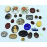 A COLLECTION OF EUROPEAN CARVED STONE PLAQUES together with buttons etc. (qty)