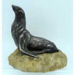 M Migneaux (C1910) French silvered bronze, Study of a seal, upon a marble base. 16 cm x 12 cm.