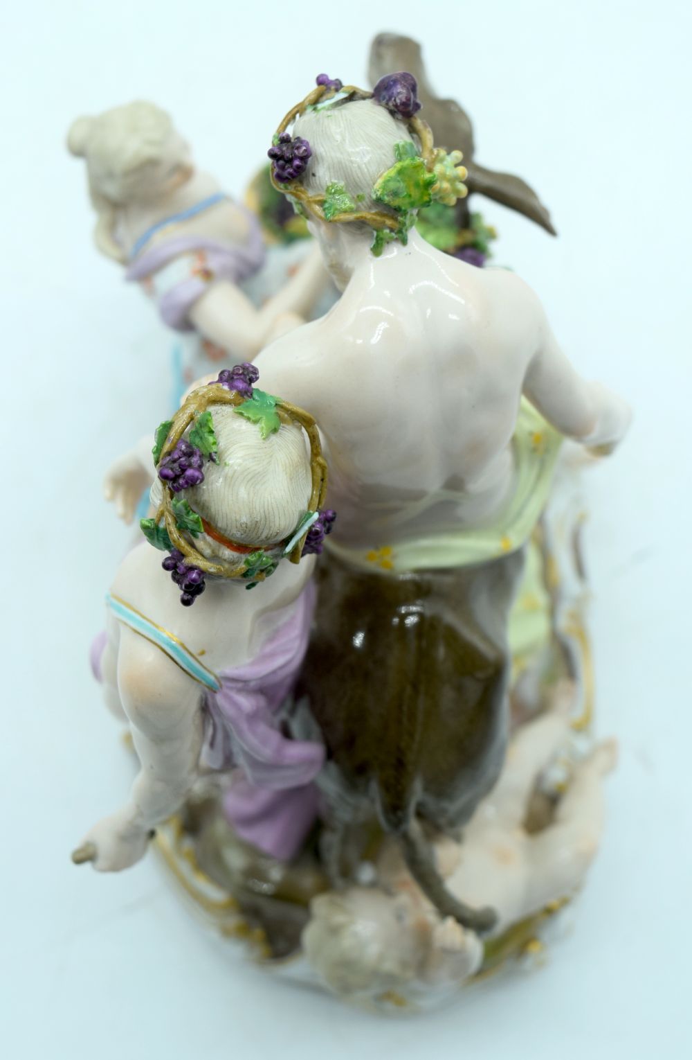 A 19TH CENTURY GERMAN MEISSEN ERNST TEICHERT PORCELAIN FIGURE OF A DRUNKEN SILENUS modelled riding u - Image 6 of 7