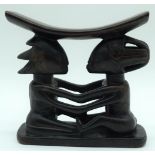 An African wooden Tribal head rest 18 x 18cm.