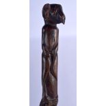 AN ANTIQUE FOLK ART CARVED WOOD SHAMAN STYLE STICK possibly tribal. 88 cm long.
