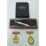 Two Masonic enamelled medals and a Book mark collectable of the Empire exhibition 1938 7cm (3).