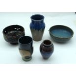 A collection of glazed studio pottery bowls and vases 17cm (5).
