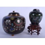 A 19TH CENTURY JAPANESE MEIJI PERIOD CLOISONNE ENAMEL JAR AND COVER together with another similar. L