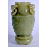A 19TH CENTURY CHINESE CARVED JADE VASE ON STAND Qing, decorated with taotie mask heads. 11 cm x 6 c