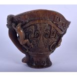 A CHINESE CARVED BUFFALO HORN TYPE LIBATION CUP 20th Century. 12 cm x 10 cm.