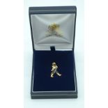 A boxed Silver gilt Johnnie Walker lapel pin .