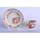 AN 18TH CENTURY ENGLISH PEARLWARE TEABOWL AND SAUCER painted with flowers. 8 cm diameter.