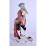 A 19TH CENTURY MEISSEN PORCELAIN FIGURE OF A MALE modelled with an unusually long beard. 12.5 cm hig