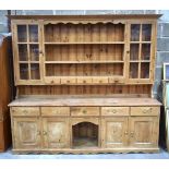 A large 5 drawer pine welsh dresser with glazed panels 200 x 218 x 47cm .