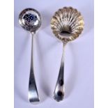 TWO SILVER CADDY SPOONS. Sheffield 1926 & London 1939. 42 grams. (2)