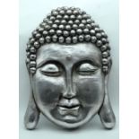 A large South East Asian head 60 x 39cm .