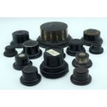 A group of vintage wooden and Bakelite trophy stands 16 x 8 cm (13).