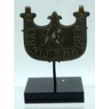 A bronze Islamic pendant heavily embossed with white metal inlay on a stand 10 x 9cm (2)
