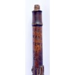 A 19TH CENTURY BAVARIAN BLACK FOREST CARVED WOOD WALKING CANE with rare inscription to the top. 78 c