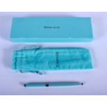 A BOXED TIFFANY & CO SILVER AND ENAMEL PEN. 14 grams. 12 cm long.