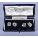 A PAIR OF 18CT GOLD AND DIAMOND CUFFLINKS. 8 grams. 3.25 cm wide.