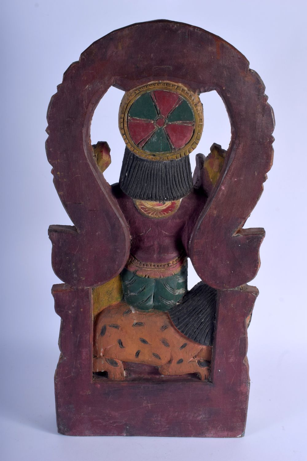 A LARGE INDIAN CARVED POLYCHROMED WOOD FIGURE OF FOUR ARMED DURGA modelled with a lion behind her. 5 - Image 4 of 5