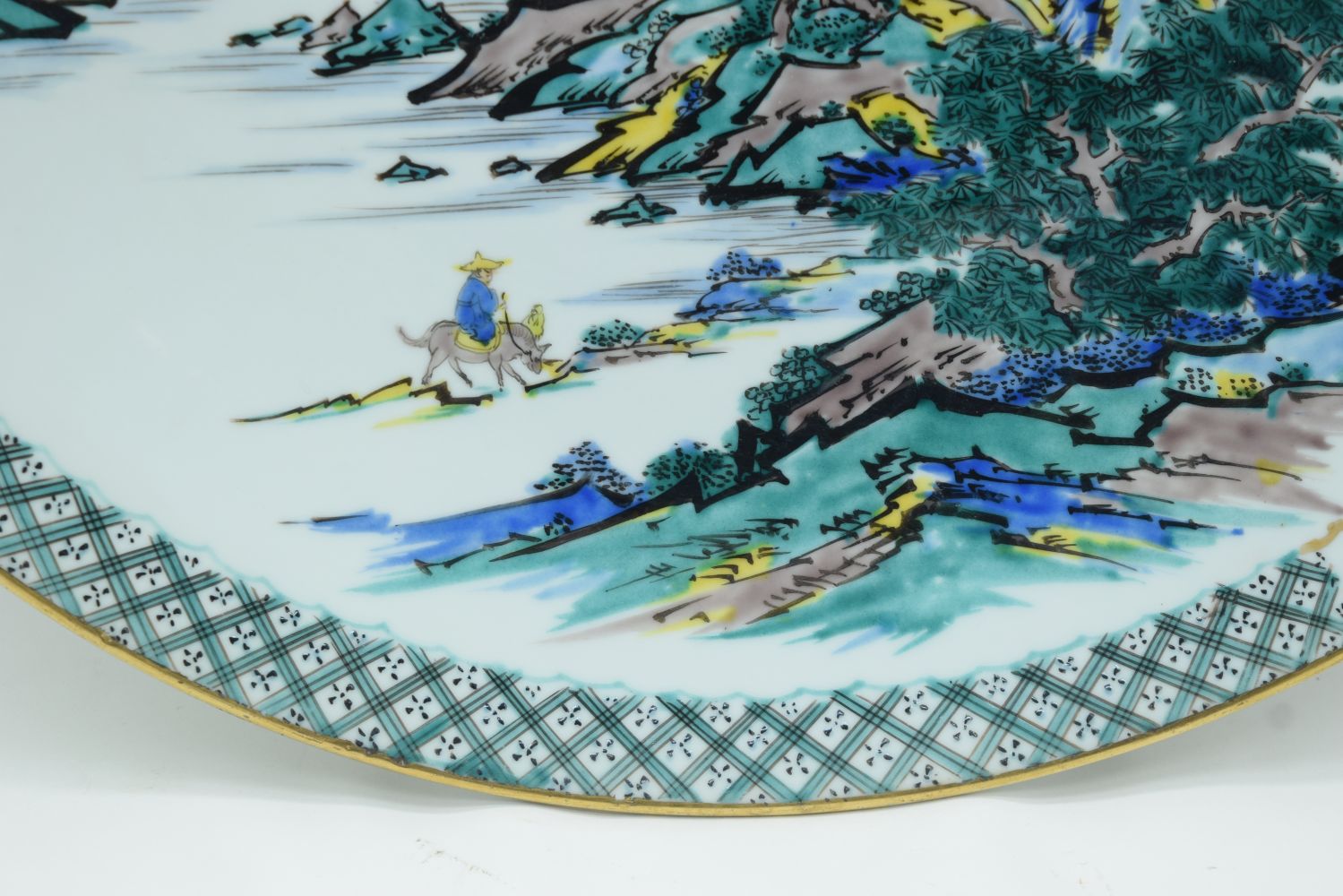 A large Japanese porcelain charger depicting a Pagoda in a landscape 45cm. - Image 3 of 5