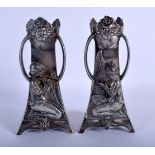 A PAIR OF ART NOUVEAU WMF SILVER PLATED VASES decorated with classical maidens. 929 grams. 18.5 cm x