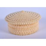 A FINE 19TH CENTURY EUROPEAN CARVED IVORY BOX AND COVER of almost floral form. 6.5 cm diameter.