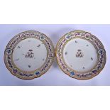 Late 18th c. Clignancourt pair of plates the centres with floral monogram BW within a border of roun
