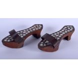 A PAIR OF ANTIQUE MIDDLE EASTERN TURKISH MOTHER OF PEARL INLAID BATH SHOES. 20 cm x 8 cm.