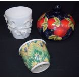 A large Moorcroft style vase together with two other vases 25 x 23cm (3).