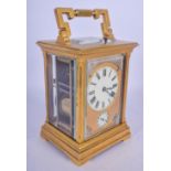 AN UNUSUAL 19TH CENTURY FRENCH AESTHETIC MOVEMENT REPEATING CARRIAGE CLOCK. 19 cm high inc handle.