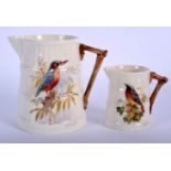 Royal Worcester barrel shaped jug painted with a kingfisher and a smaller jug painted with a redsta