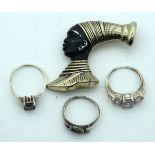 Three silver (925) rings and a gild broach of an African woman (4)