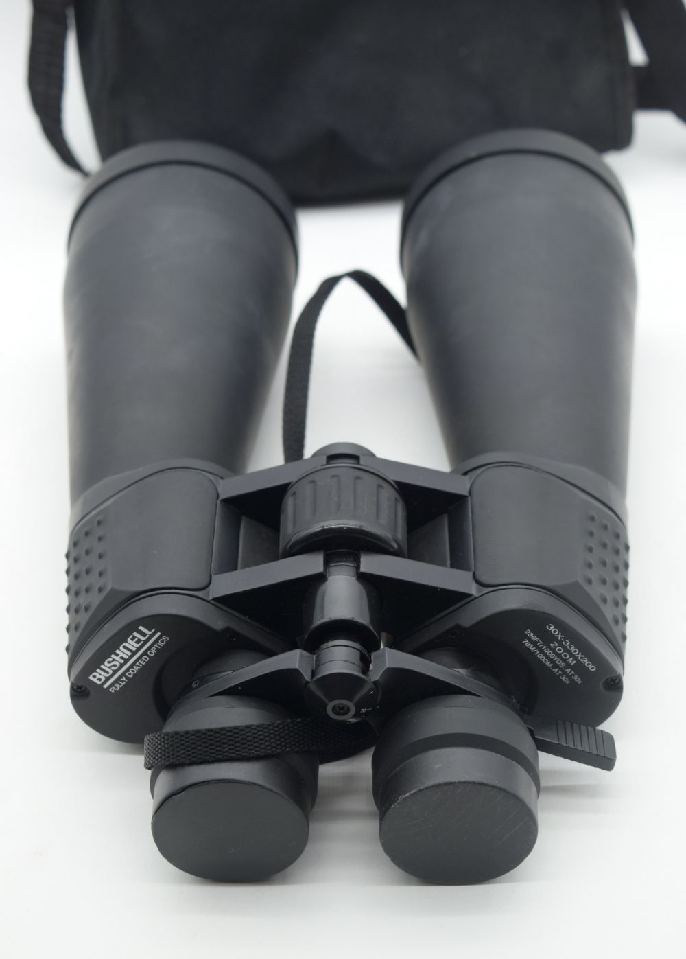 A pair of Bushnell binoculars together with a set of Optimax binoculars. 30cm (2). - Bild 3 aus 4