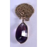 A GOLD MOUNTED AMETHYST NECKLACE. 13 grams. 56 cm long, pendant 4 cm x 1.5 cm.