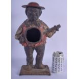 AN ANTIQUE AMERICAN PAINTED CAST IRON FIGURAL CLOCK CASE. 40 cm x 17 cm.