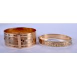 TWO 9CT GOLD PLATED BANGLES. 43 grams. 6.5 cm x 5.5 cm. (2)