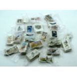 A collection of Cigarette collectors cards many full sets Players, Wills, Seniors, . Qty.