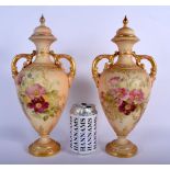 Royal Worcester pair of two handled blush ivory vases and covers painted with roses, date mark 1919,