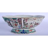 A MID 19TH CENTURY CHINESE FAMILLE ROSE PORCELAIN LOBED DISH Jiaqing mark and period, painted with g