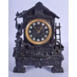 AN ANTIQUE CAST METAL BLACK FOREST TYPE MANTEL CLOCK. 28 cm x 21 cm.