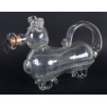 A RARE ANTIQUE CLEAR GLASS NOVELTY DOG DECANTER. 27 cm x 18 cm.