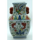 A Chinese twin handled vase decorated with Carp and birds 37cm.