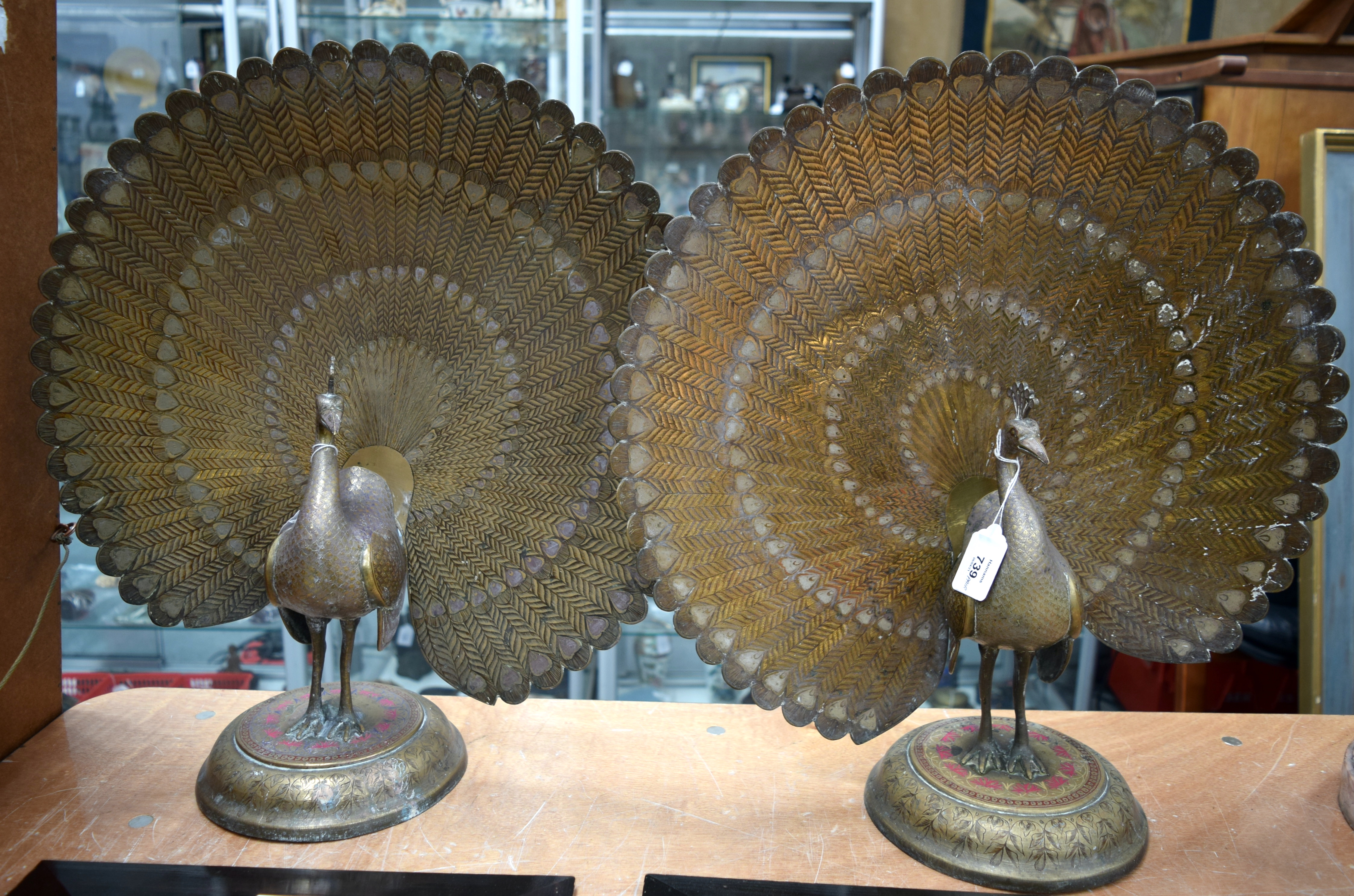 A RARE LARGE PAIR OF EARLY 20TH CENTURY INDIAN ENAMELLED BRASS PEACOCKS upon circular bases decorate - Image 7 of 11