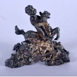 AN ANTIQUE CONTINENTAL SILVER HORSE AND CHERUB. 75 grams. 5 cm x 5.5 cm.