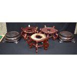 A group of large Chinese wooden stands 18 x 29cm (5).